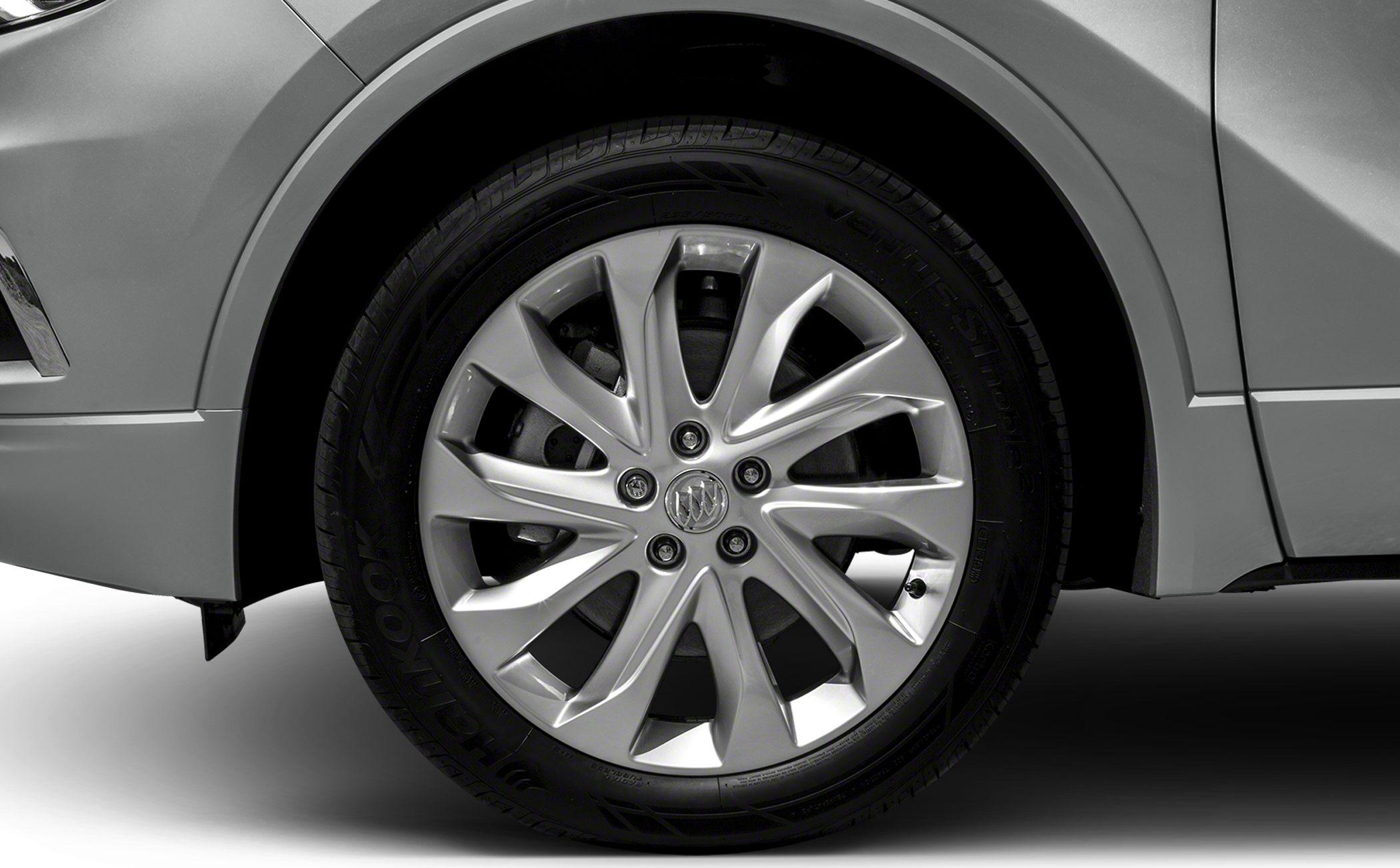 Alloy wheel and tire close-up with multi-spoke design