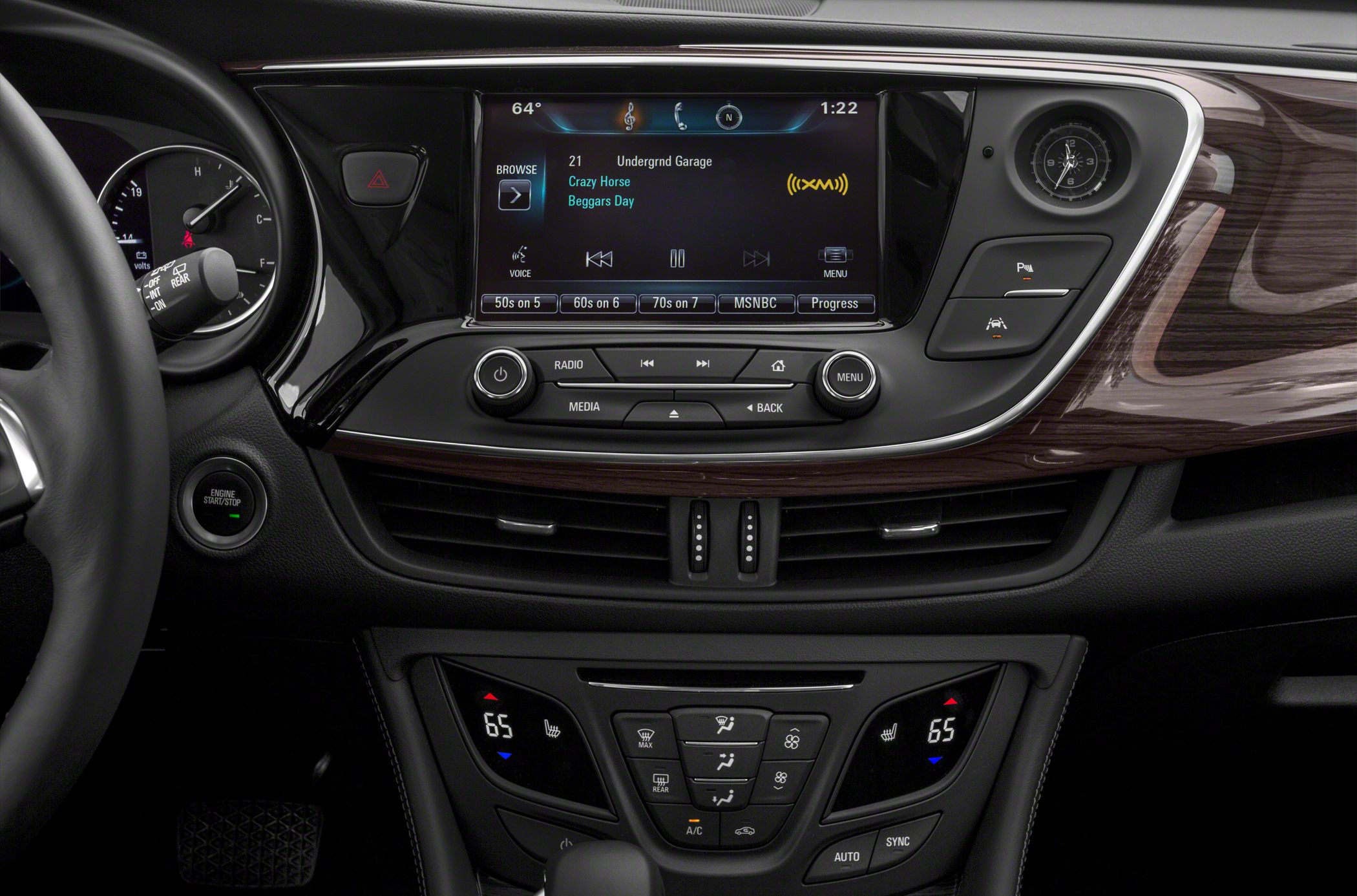 Car dashboard with digital infotainment screen and climate controls