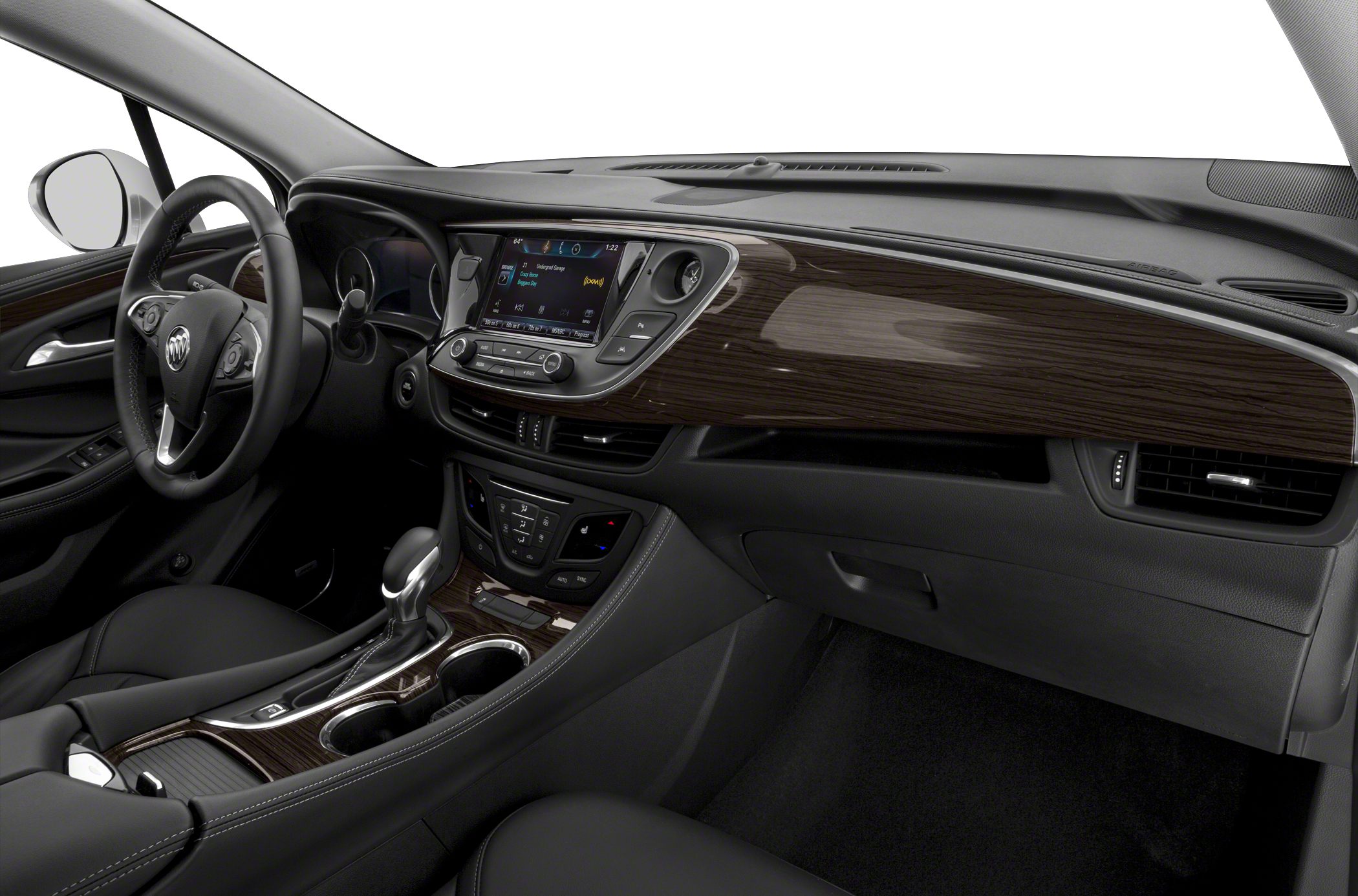 Wood-trimmed dashboard and center console with infotainment system and leather seating.
