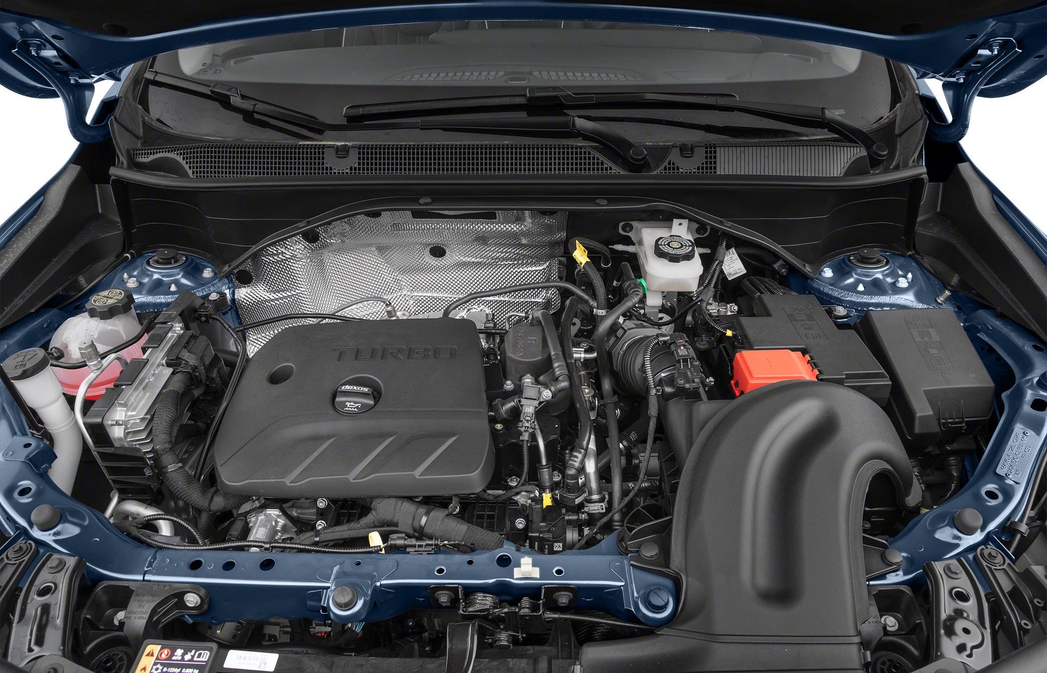 Turbocharged engine bay with key components and plastic engine cover