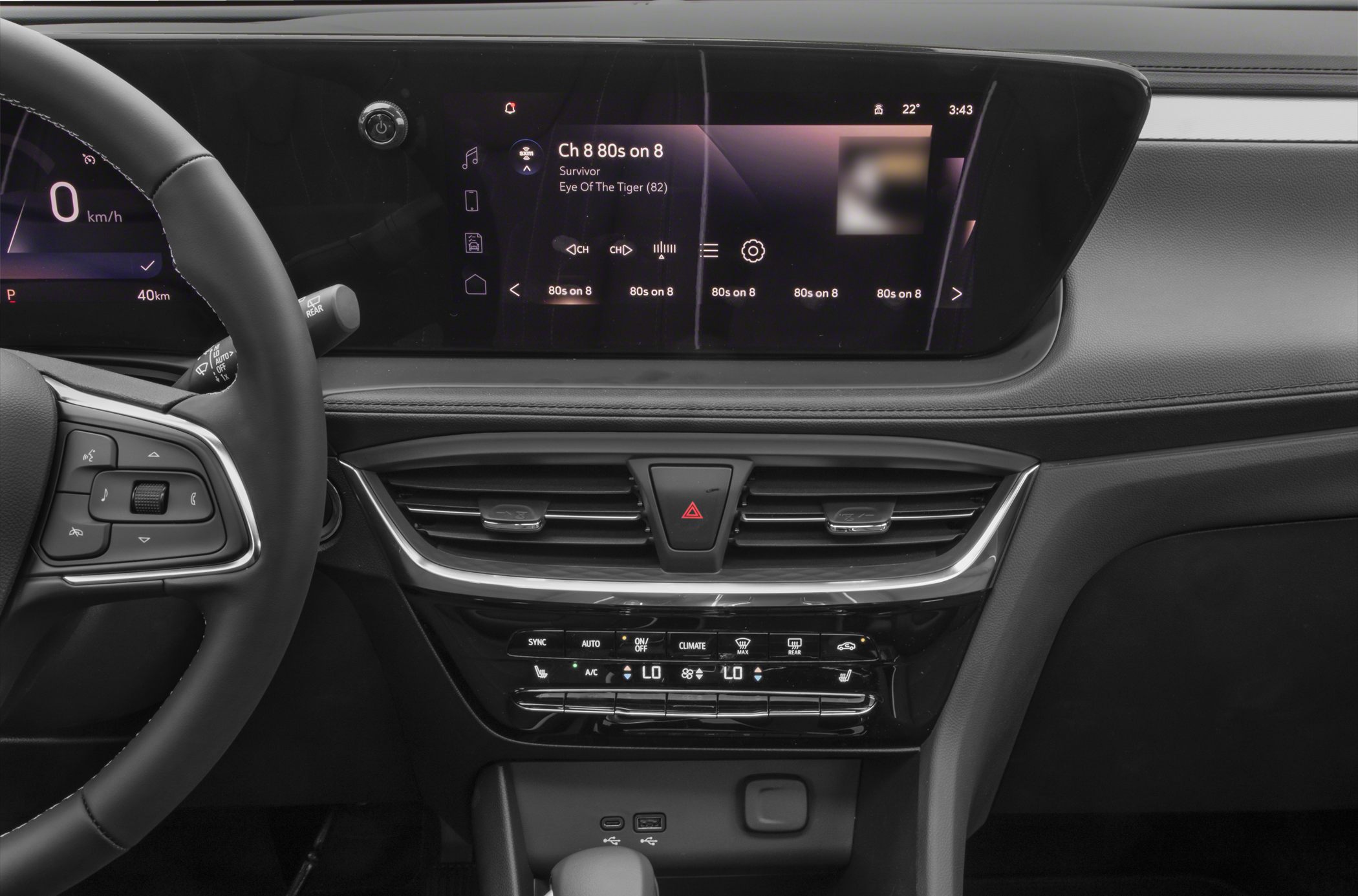 Wide digital infotainment display and dual-zone climate controls