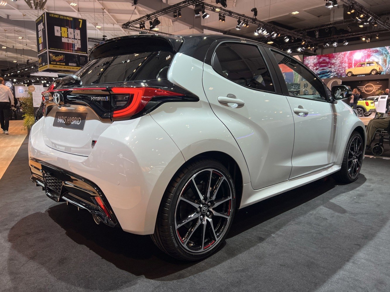 Rear and side view with sporty tail lights and alloy wheels