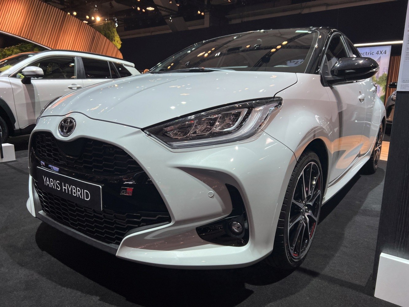 Sporty front grille and sleek LED headlights of a hybrid hatchback
