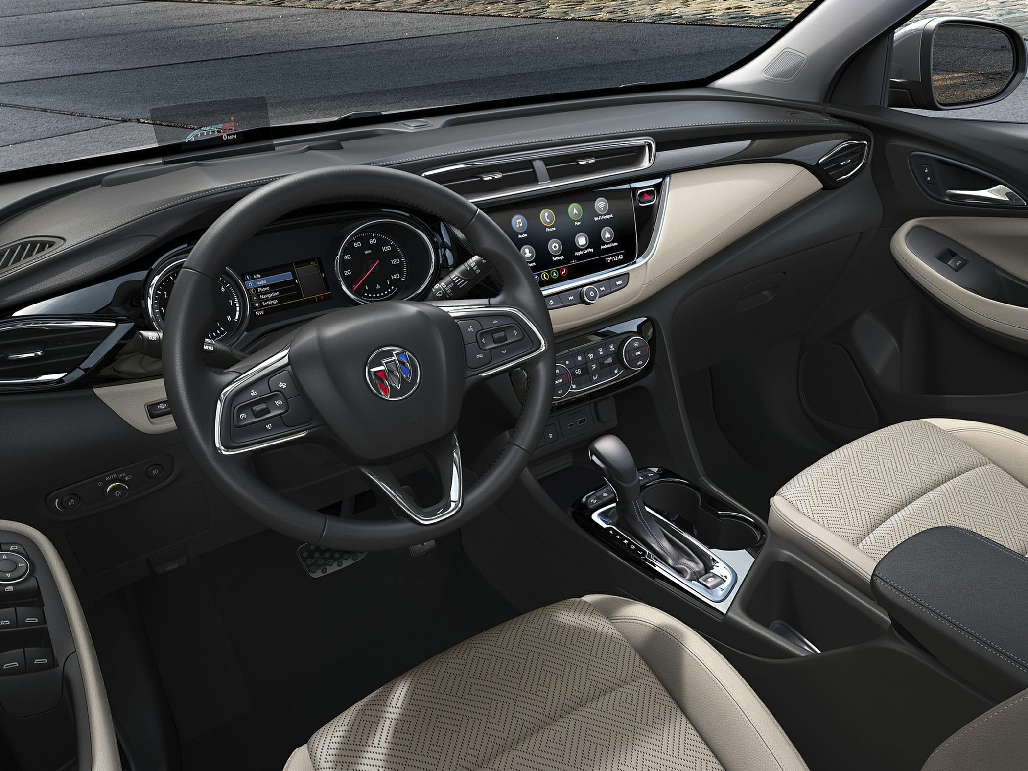 Steering wheel, digital dashboard, infotainment screen, center console controls