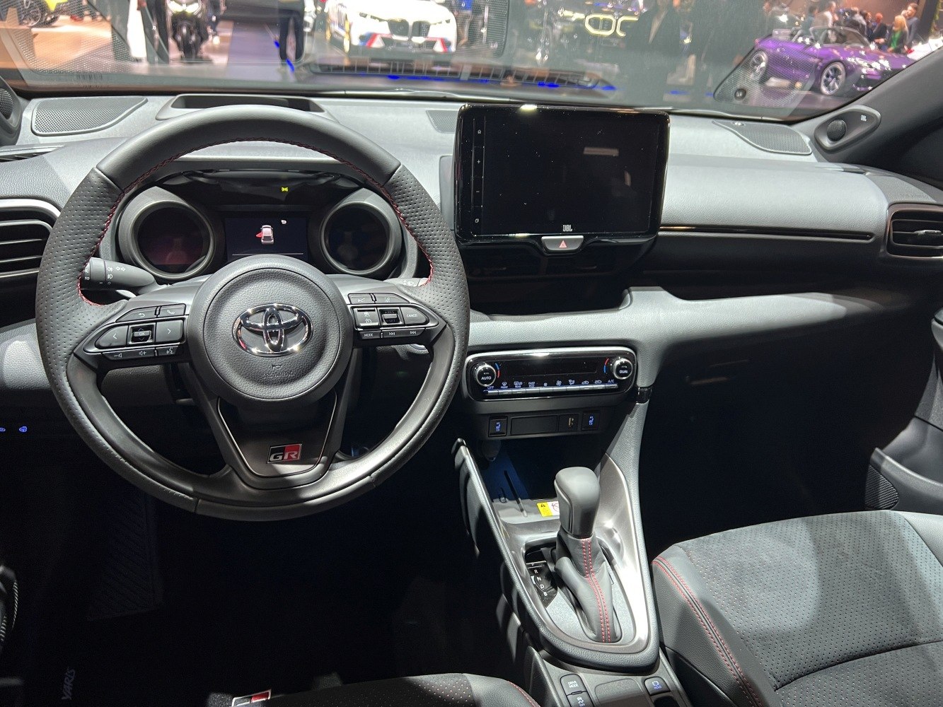 Steering wheel with controls and touchscreen dashboard display