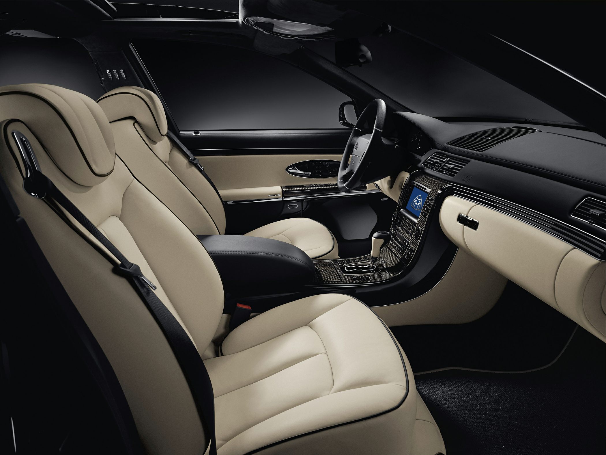 Beige leather seats with modern dashboard and tech features