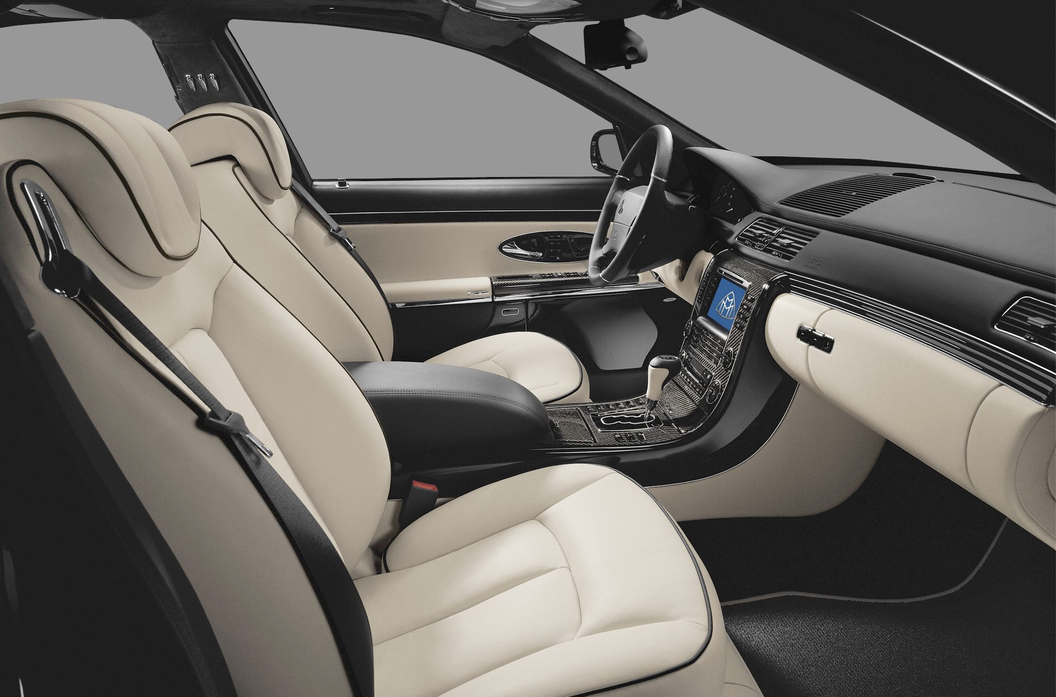 Cream leather seats and carbon trim dashboard with premium features