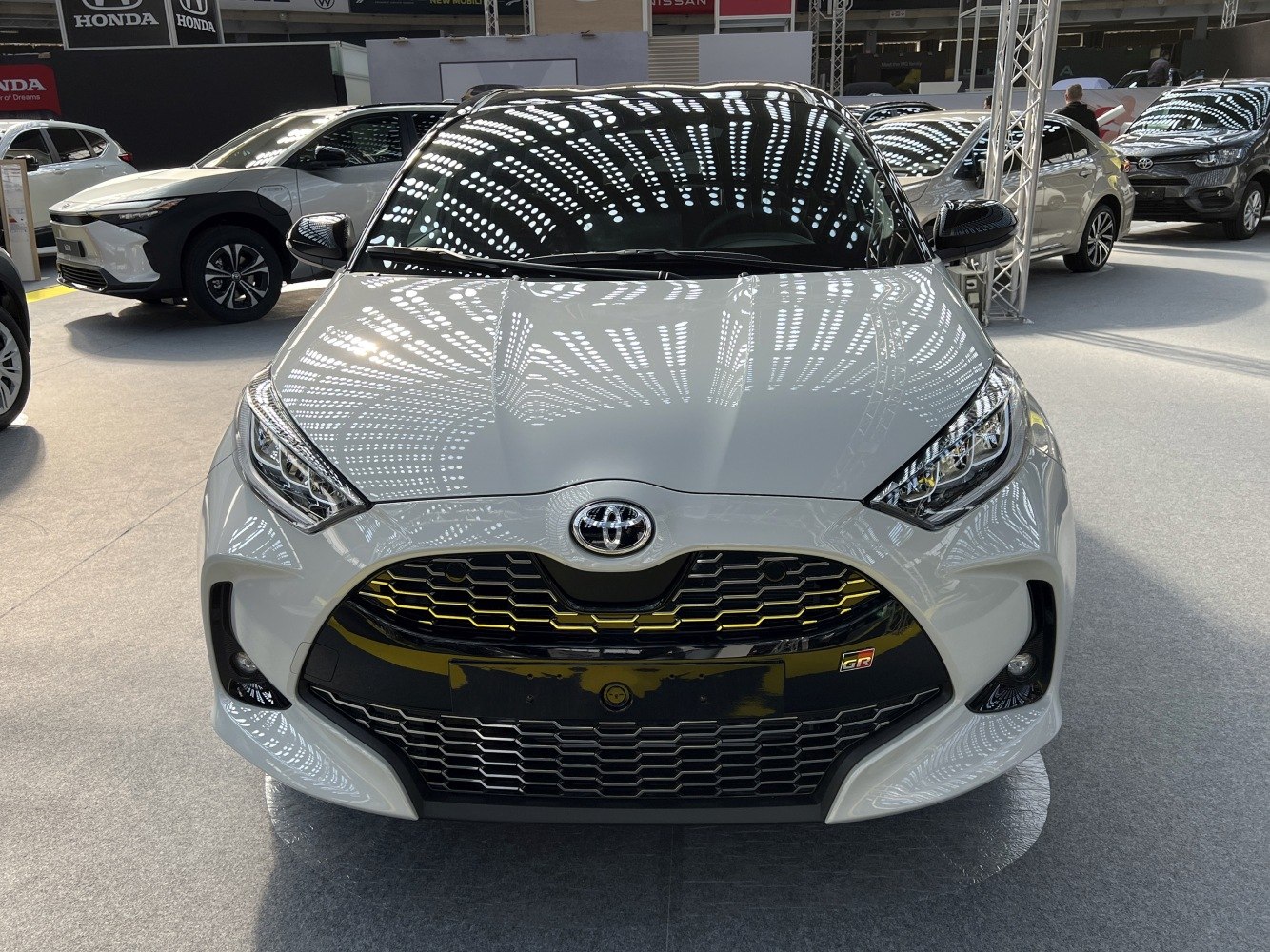 Front view with sporty grille and detailed headlights