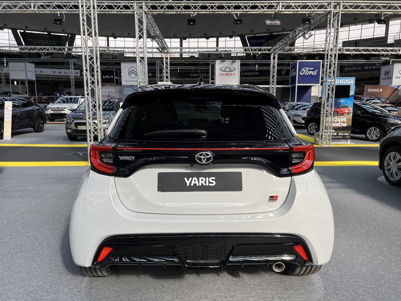 Sporty hatchback rear with distinctive tail lights and GR Sport badge