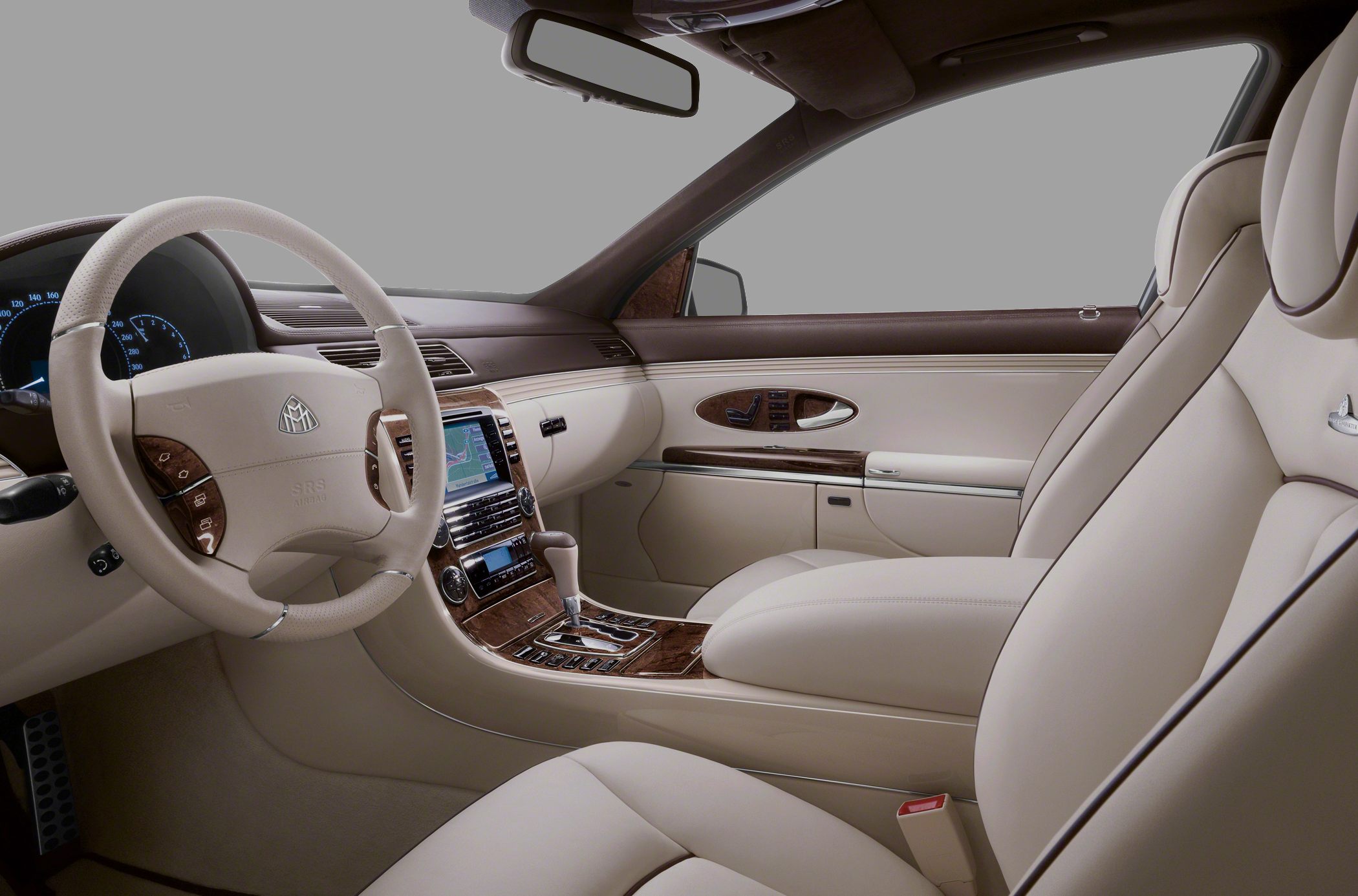 Luxury leather seating with wood trim and high-tech central console