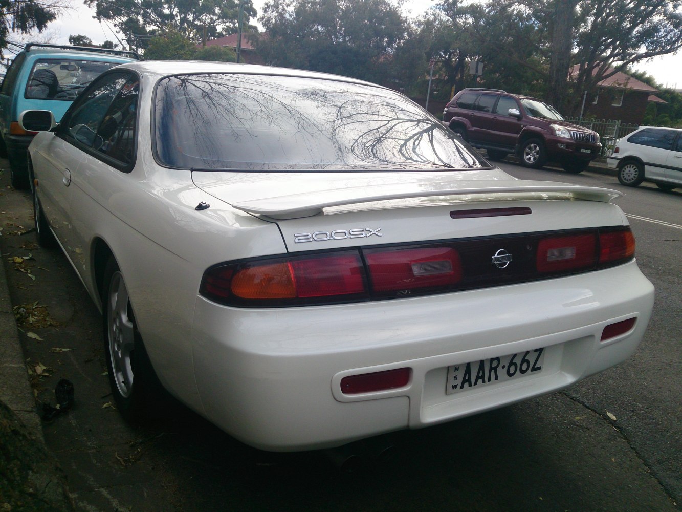Rear view with spoiler and distinctive tail lights