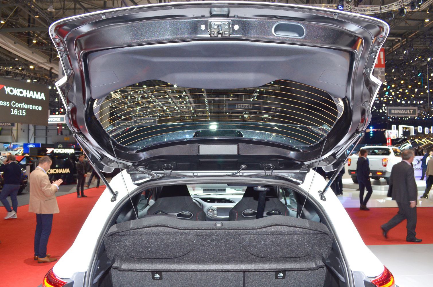 Open hatchback trunk interior with rear seats and cargo space