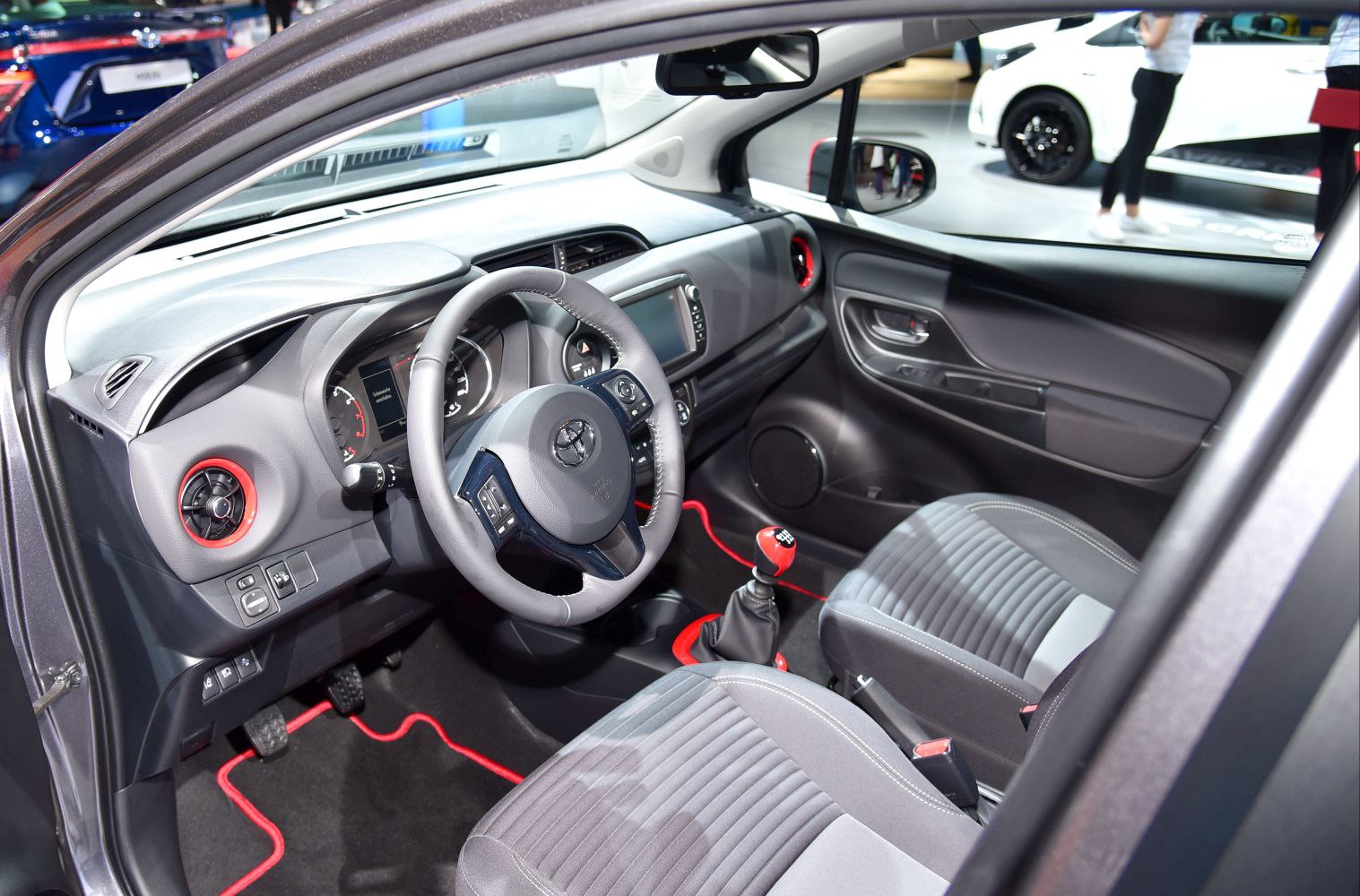 Interior view with manual transmission and modern dashboard design.
