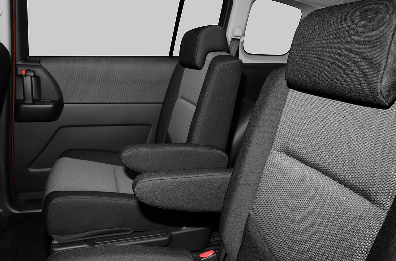 Fabric seats with armrests in car interior