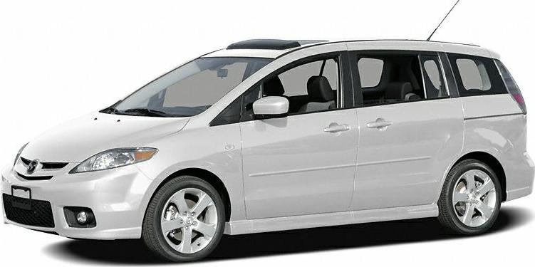 Side profile of a compact MPV with sliding rear doors and roof antenna