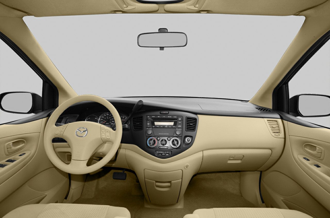 Beige dashboard and steering wheel with classic controls