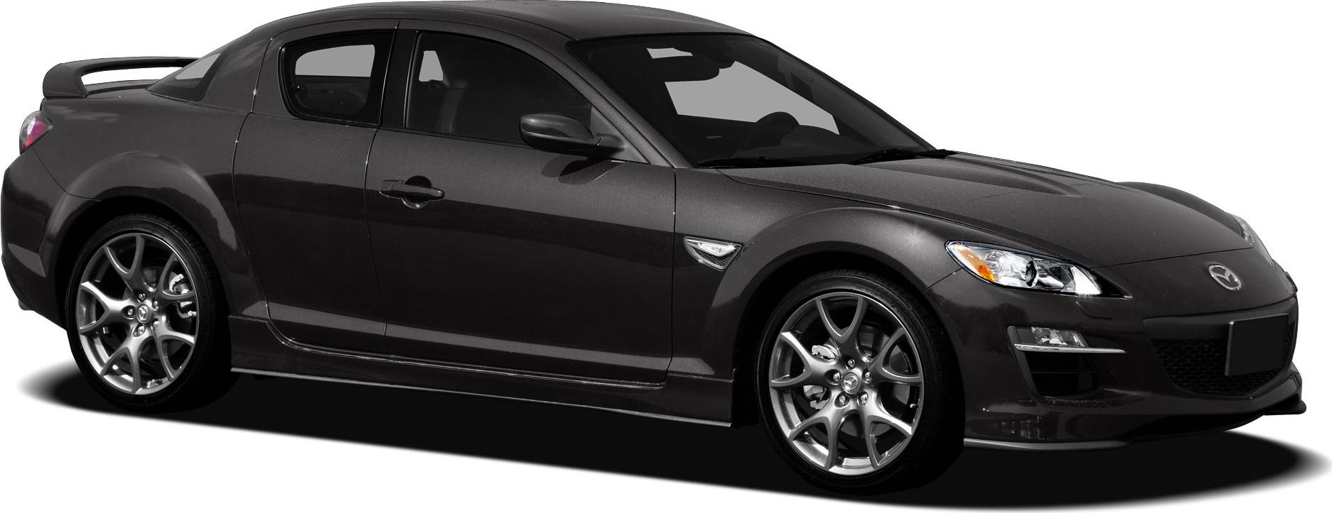Sports coupe with rear spoiler and alloy wheels
