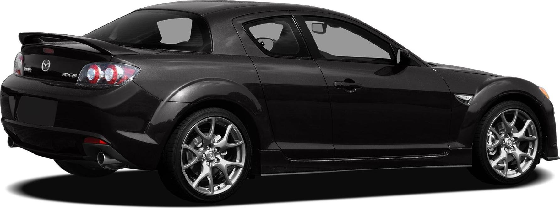 Rear side view of a sporty coupe with spoiler and distinctive alloy wheels.