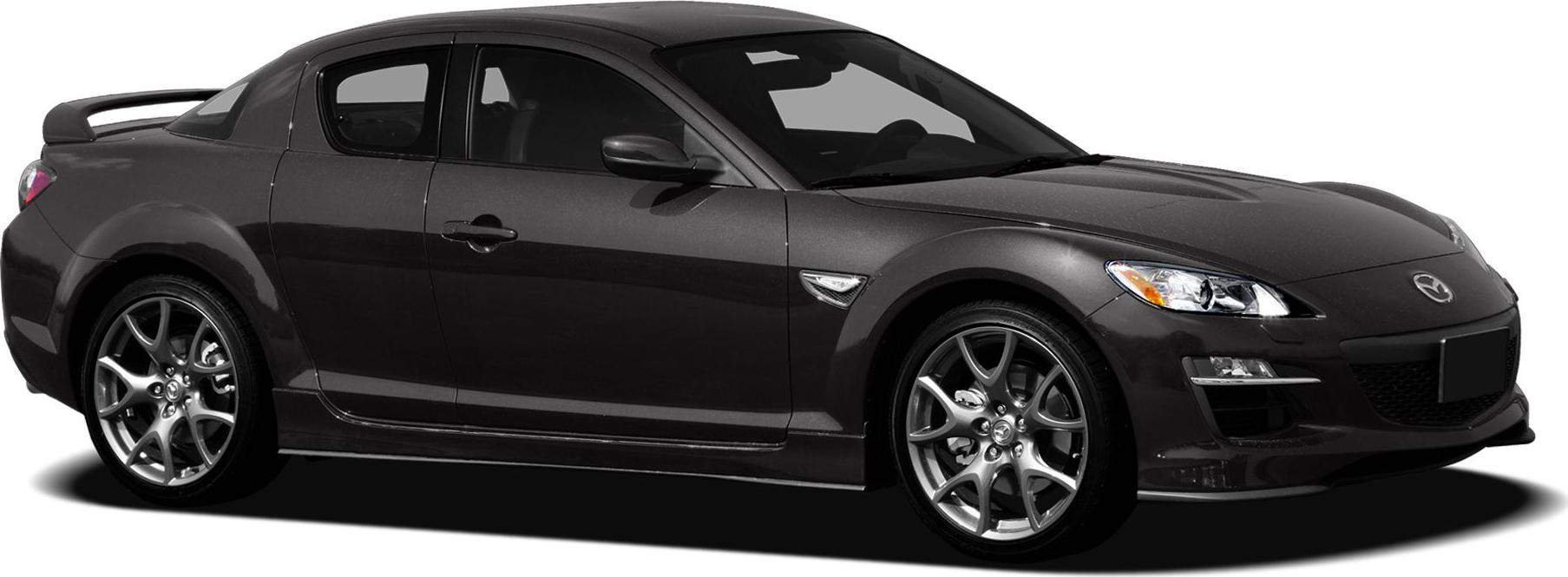 Sports coupe with rear spoiler and alloy wheels
