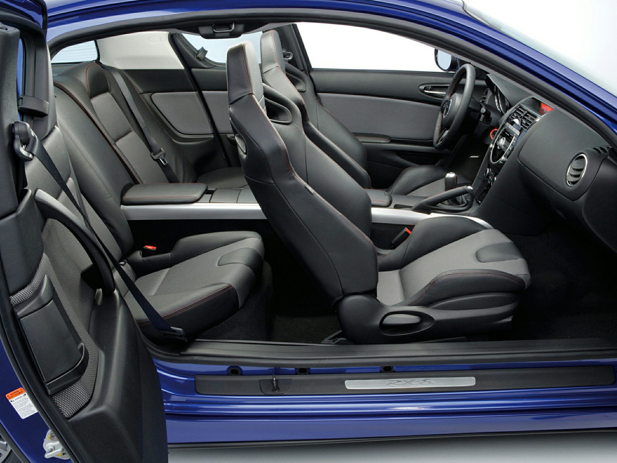 Sport seats and interior cabin layout with rear seating visible