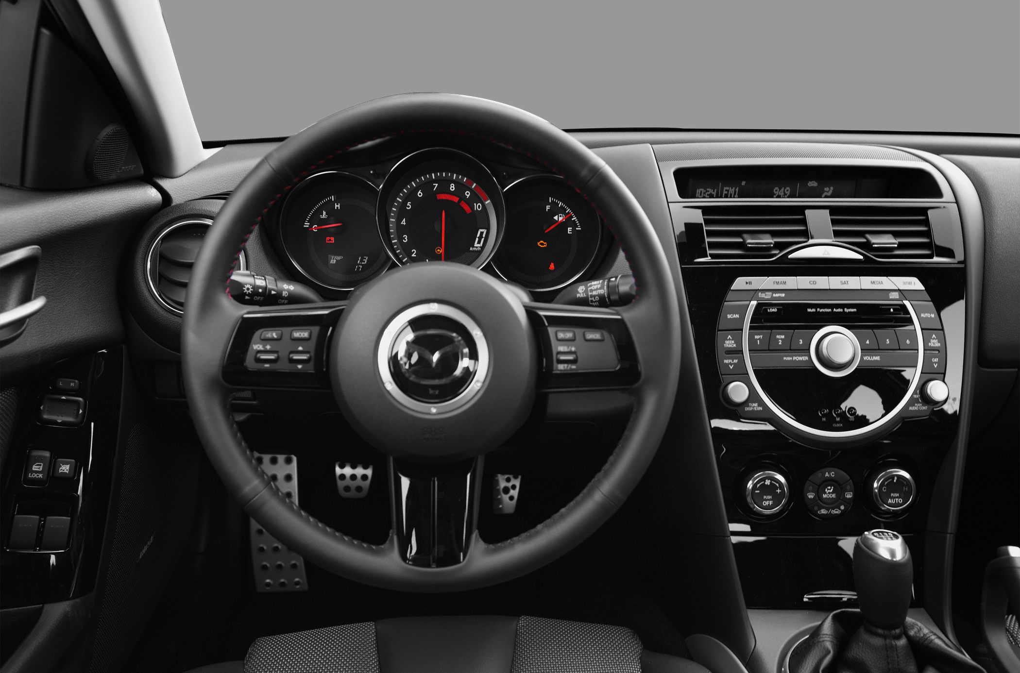 Mazda RX-8 style dashboard and steering wheel with controls