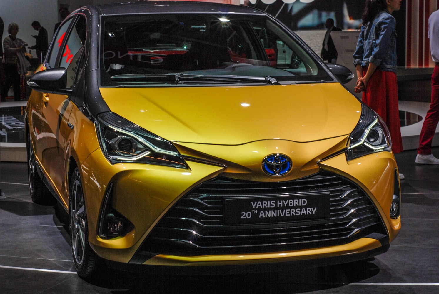 Front view with sharp headlights and distinctive grille