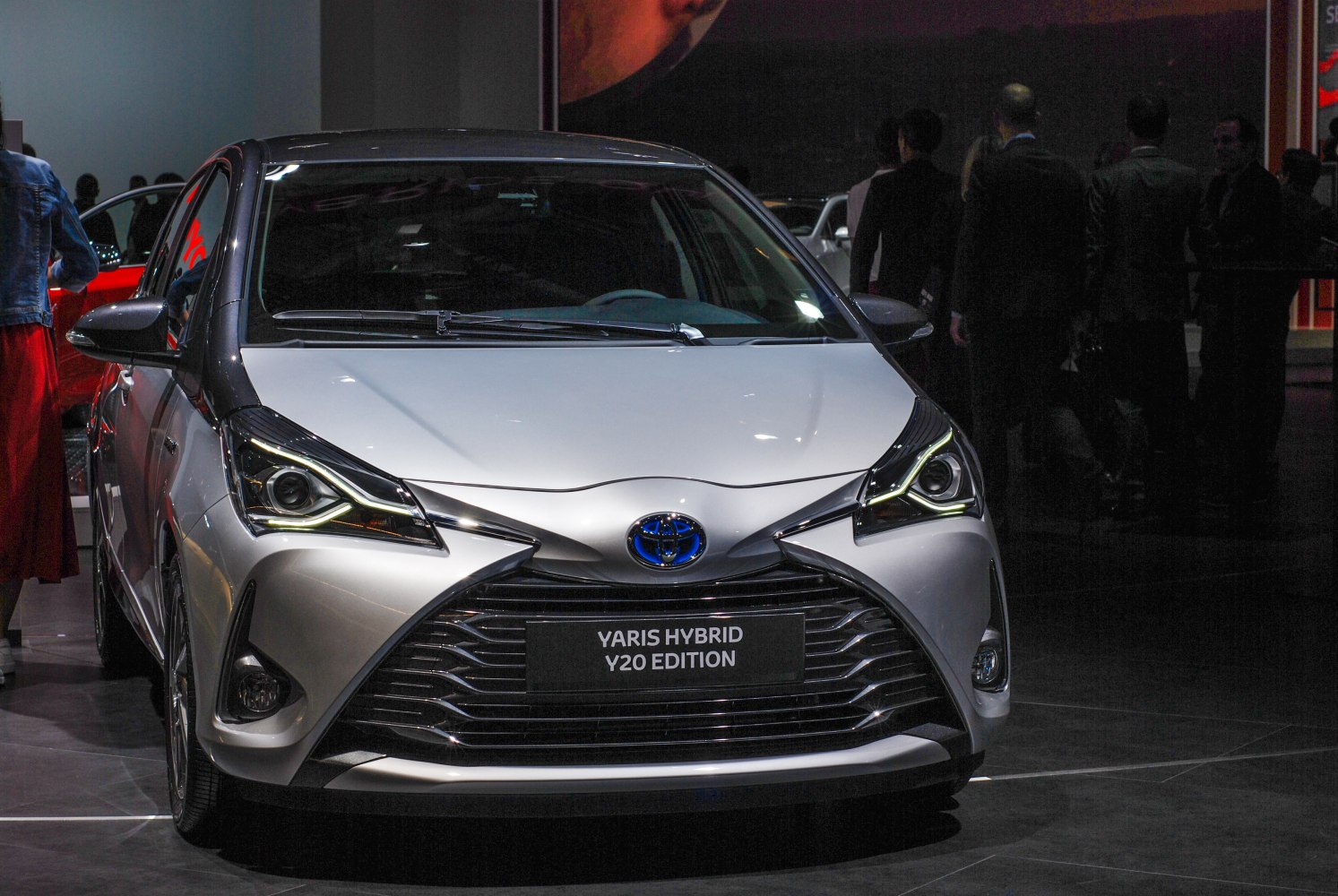 Front view with distinctive headlights and large grille