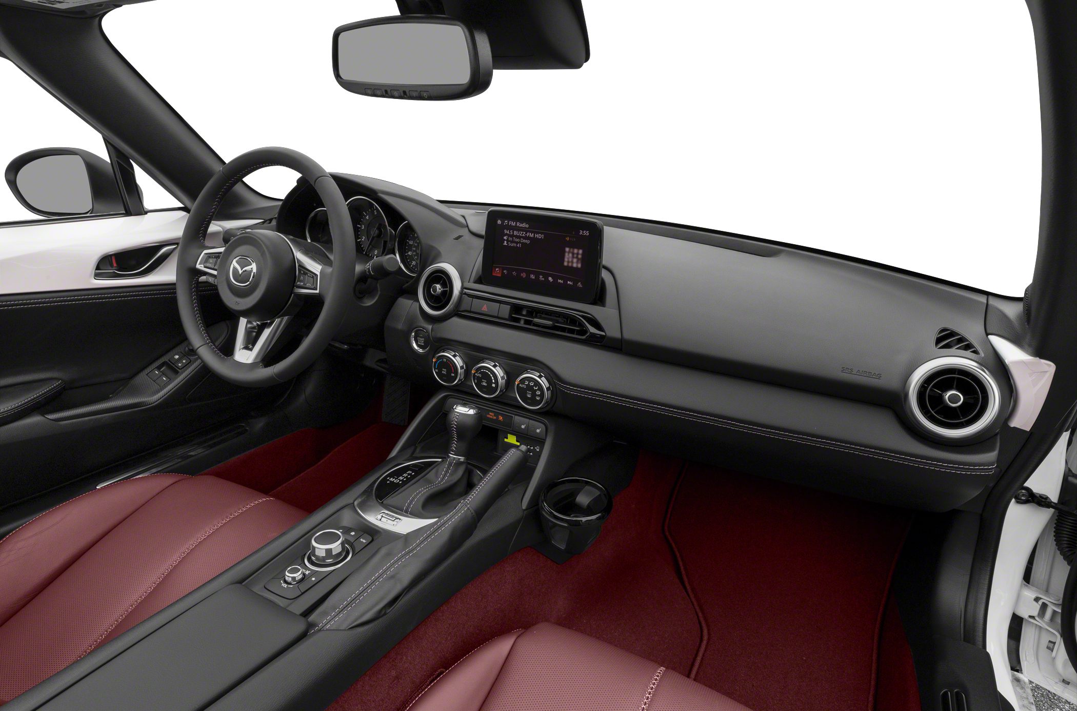 Dashboard interior with infotainment, red seats, and automatic gear shift