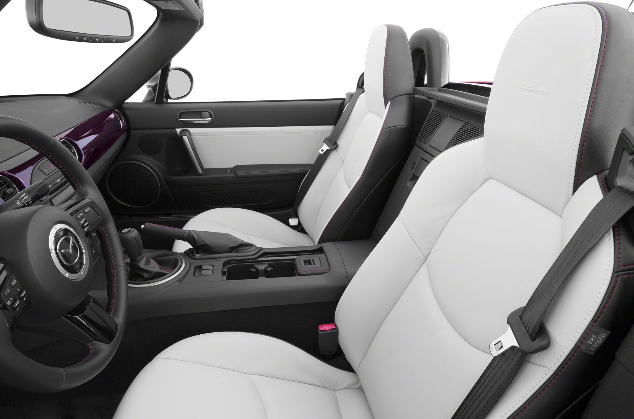 White leather seats with manual gear and dashboard