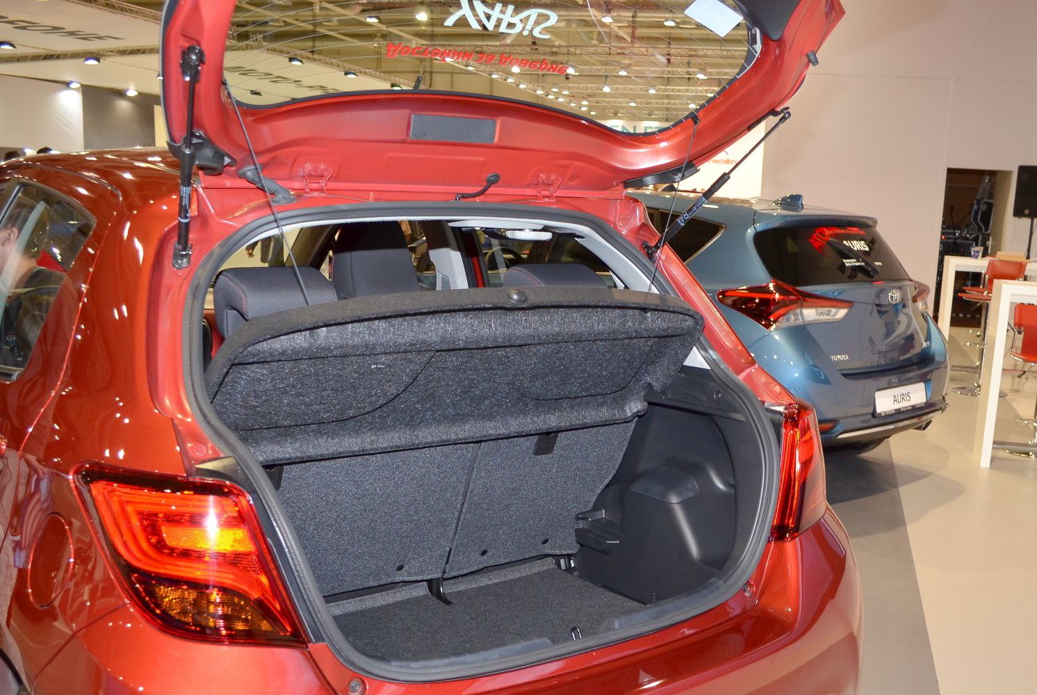 Open rear hatch with trunk cargo space and rear seats visible