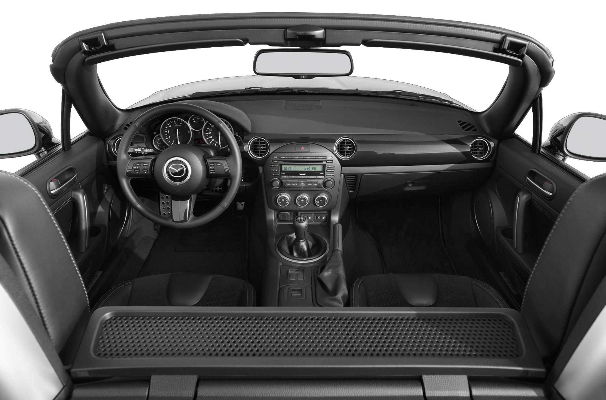 Convertible interior with manual gearshift and Mazda steering wheel