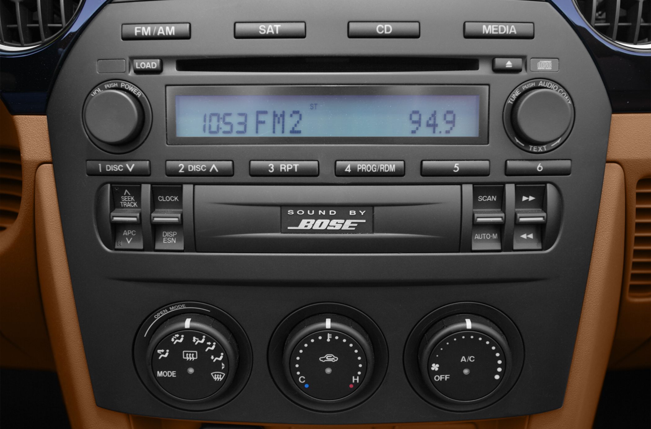 Car audio system with Bose and manual climate control knobs