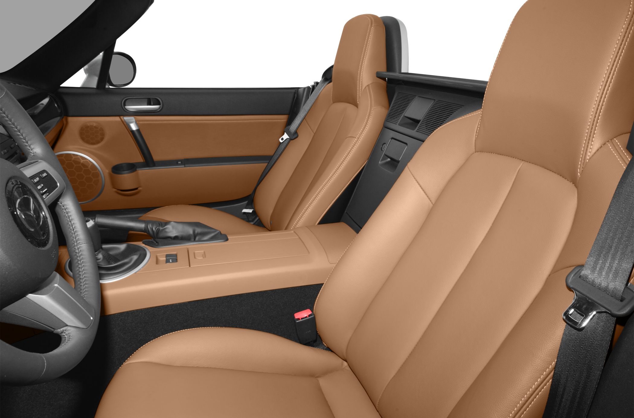 Tan leather seats and center console with manual gear lever