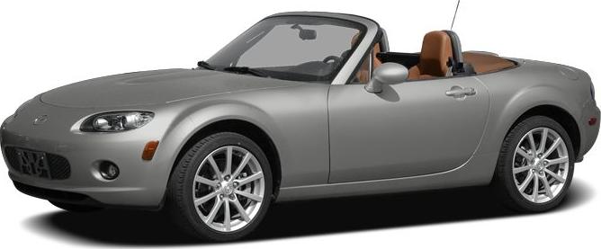 Silver convertible sports car with open roof and alloy wheels