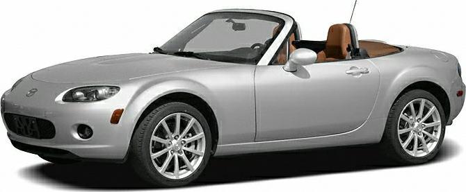 Silver convertible roadster with aerodynamic design and brown leather interior.