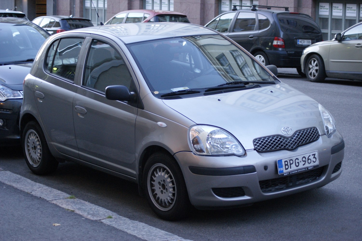 Silver 5-door hatchback front and side view