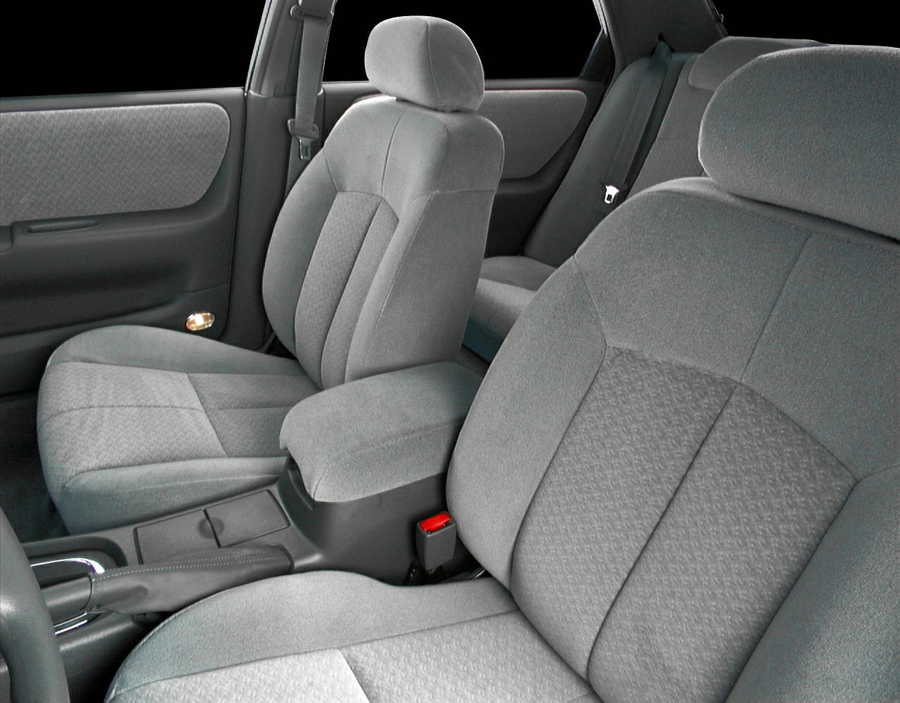Fabric upholstered front seats with center armrest and door panel