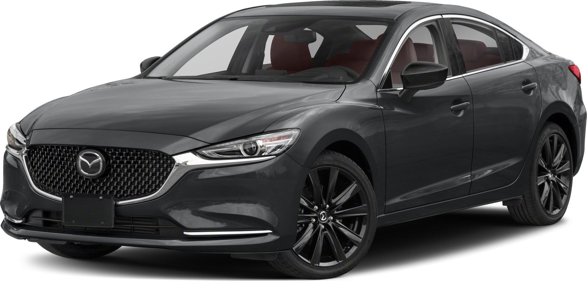 Front grille and black alloy wheels of a modern sedan