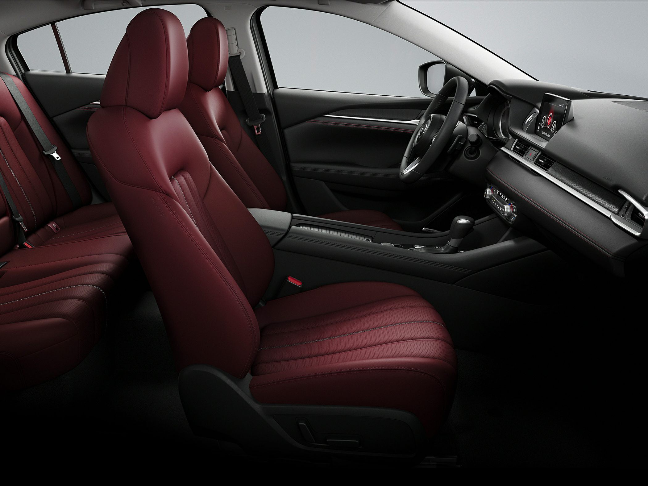 Premium red leather seats and modern dashboard design