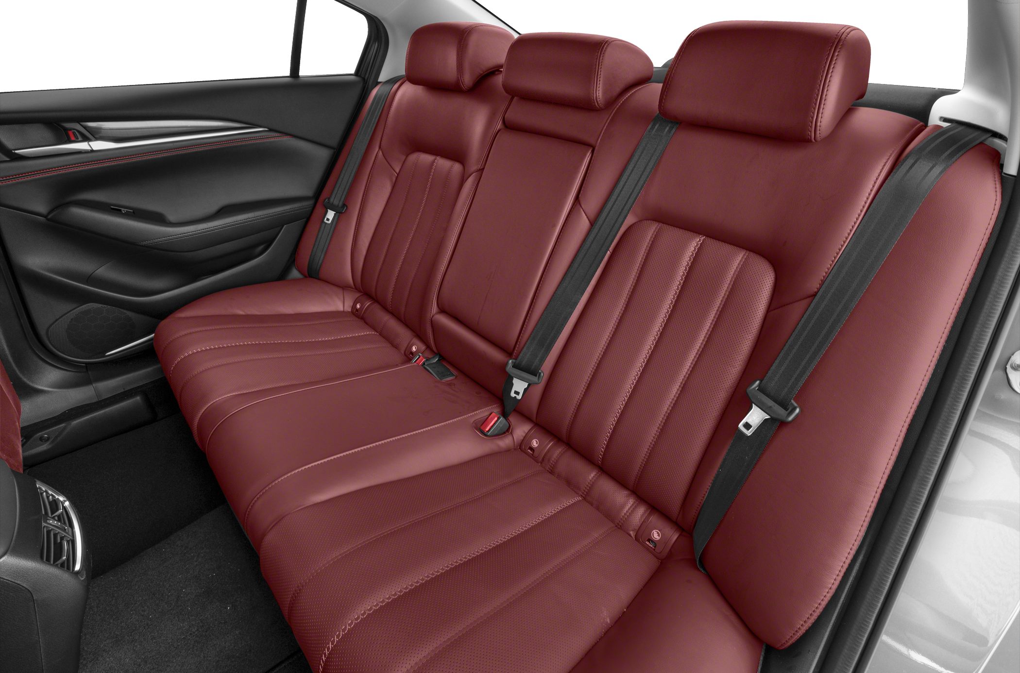 Red leather rear seats with black seat belts and door trim