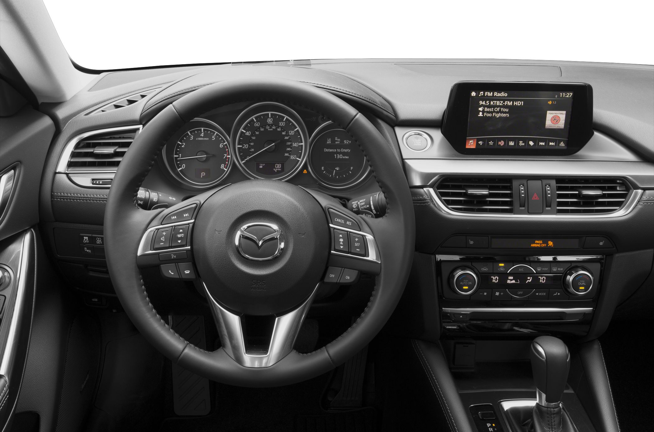Interior dashboard with multifunction steering wheel and central infotainment display