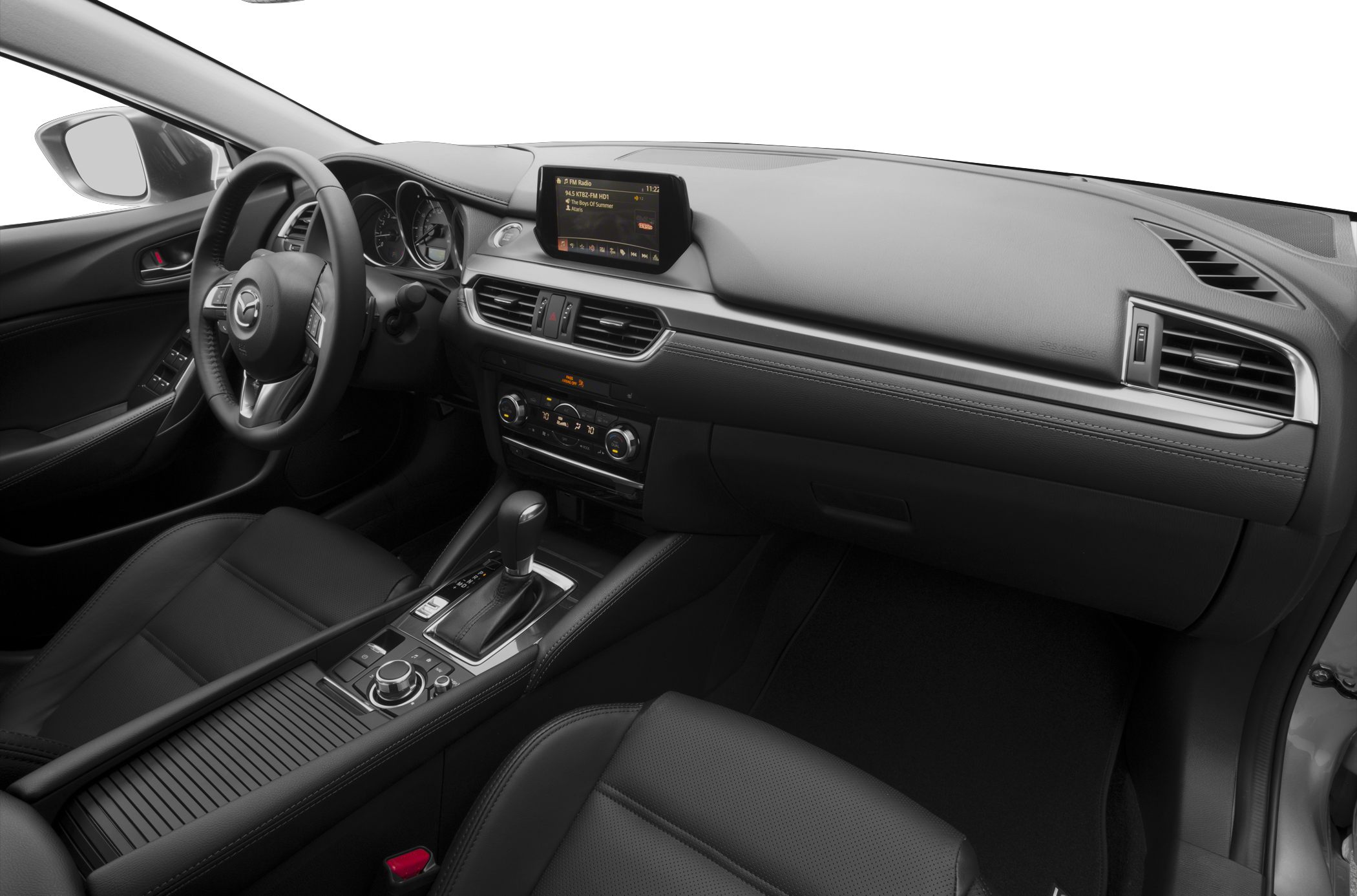 Interior dashboard and center console with infotainment screen and gear lever