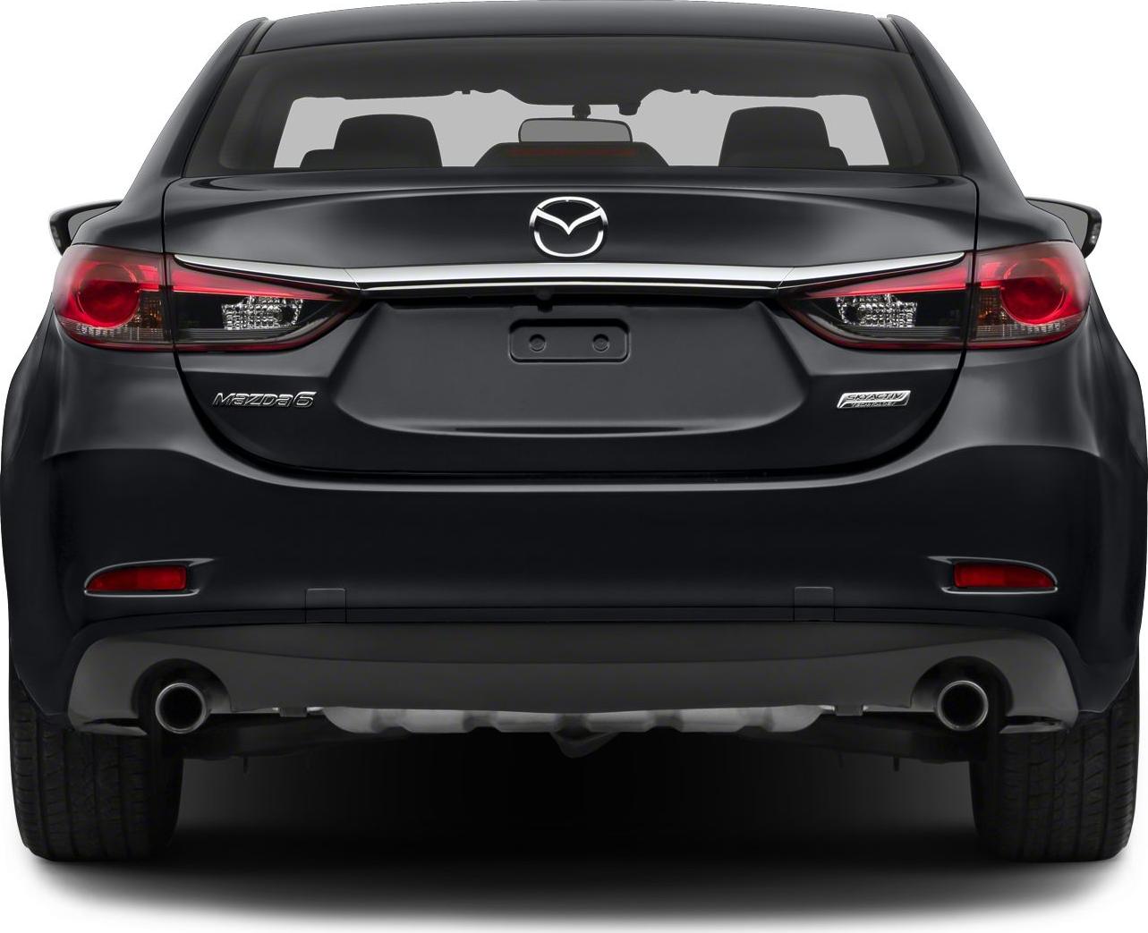 Rear view with sharp tail lights and dual exhaust pipes