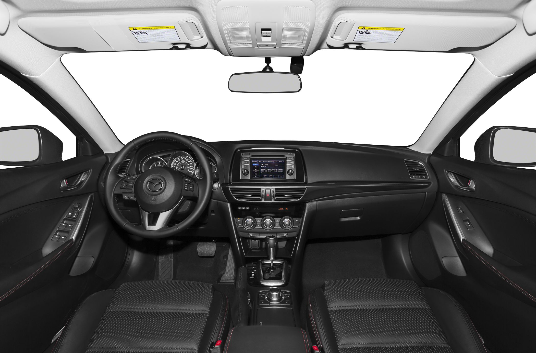 Dashboard, steering wheel, infotainment system, and climate controls.