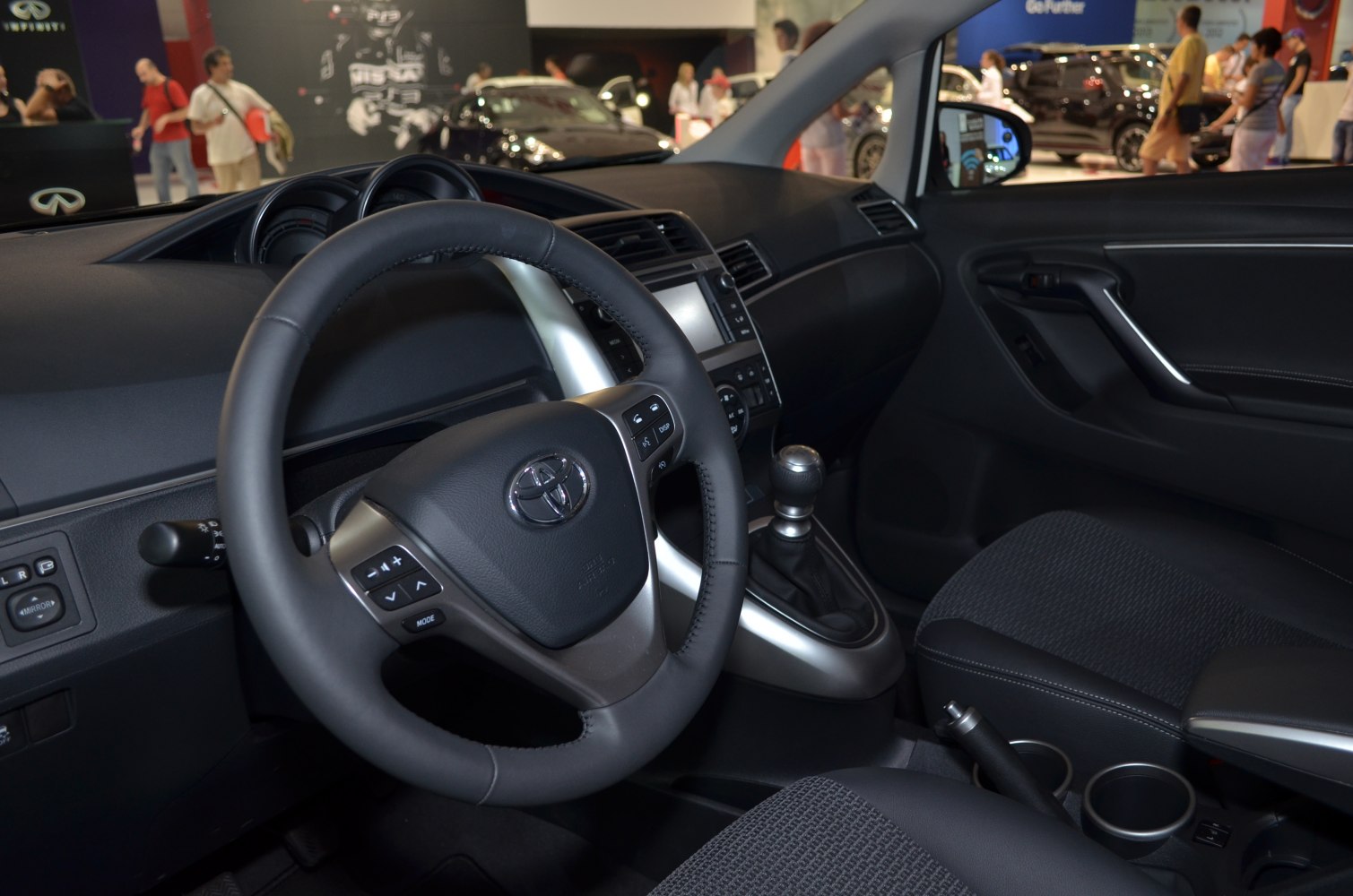 Steering wheel and dashboard with manual gear shift in modern car interior