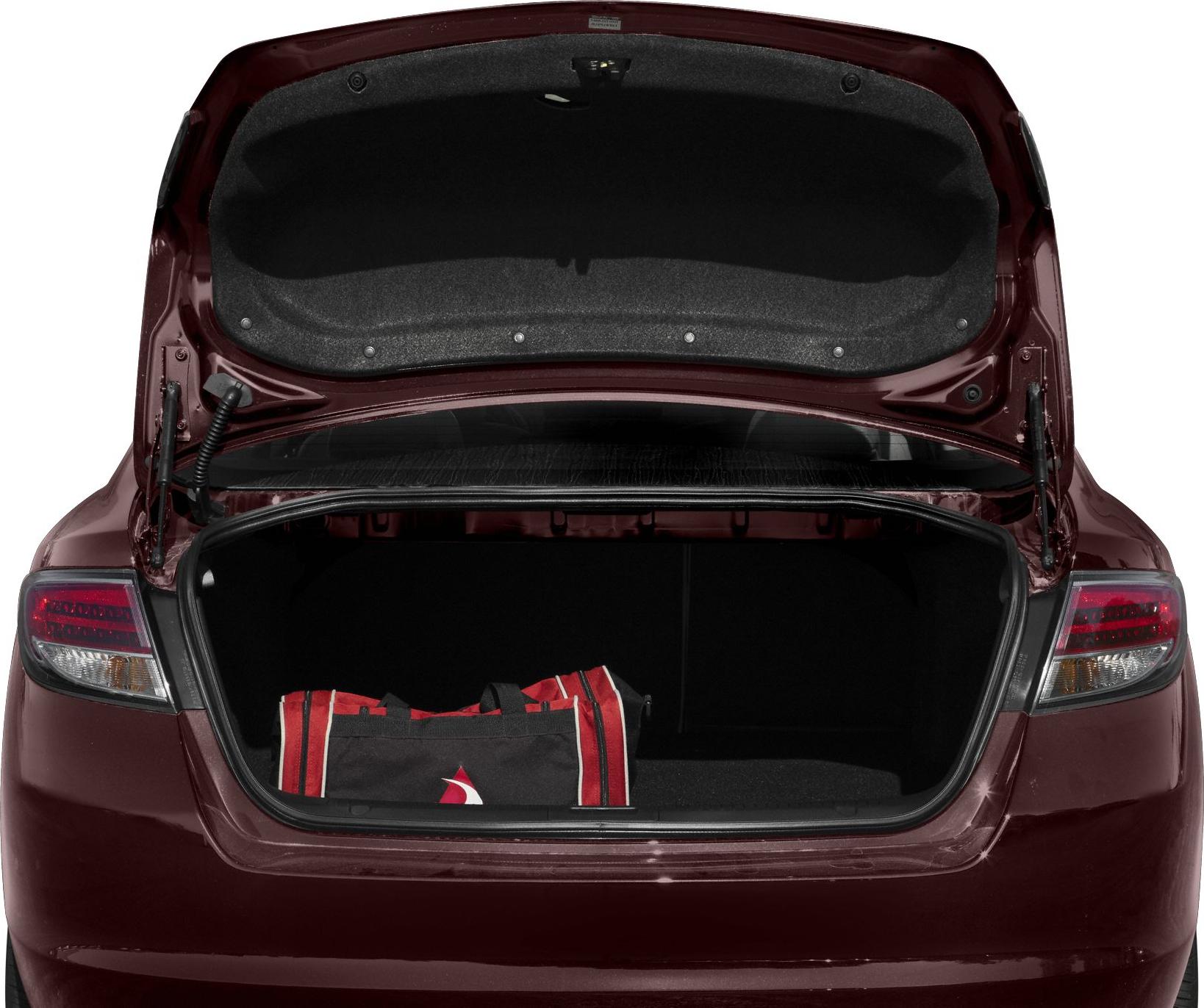 Open sedan trunk with a sports bag inside