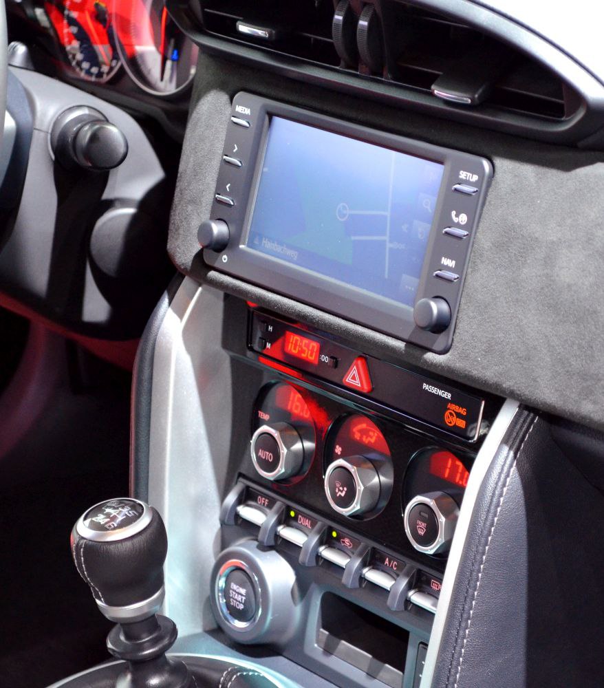 Dashboard touchscreen, climate controls, manual gear stick