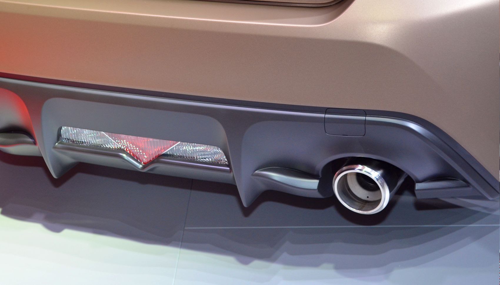 Rear diffuser with exhaust tip and rear reflector close-up