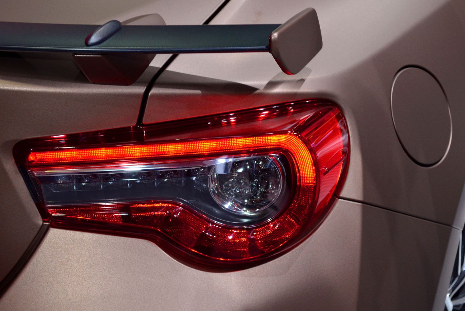 Close-up of LED rear taillight with rear spoiler