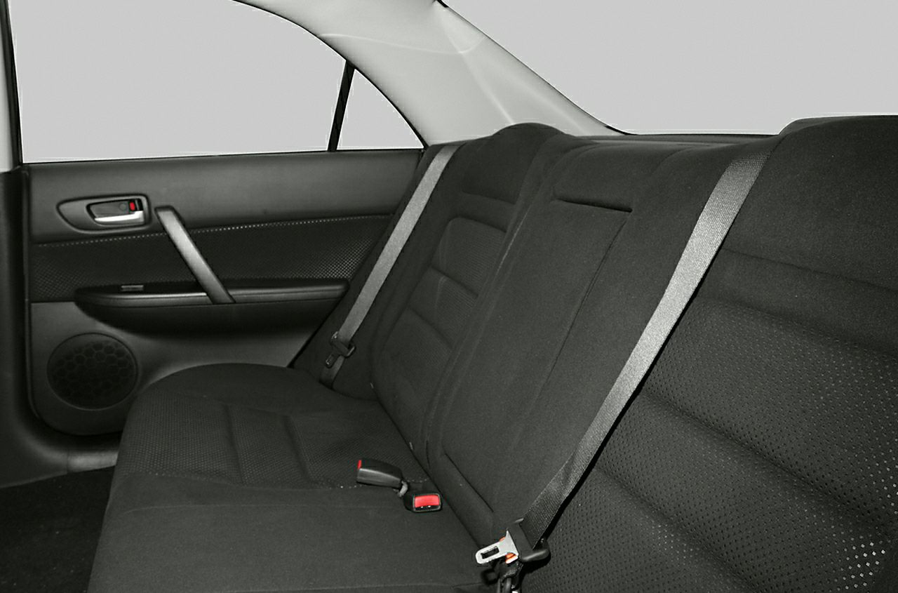 Black fabric rear seats with seat belts and door panel